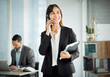 © peopleimages.com - Business woman, talking and phone call for lawyer networking about labor law case in office, Thinking, smile and corporate attorney with legal consultation with communication and expert advice
