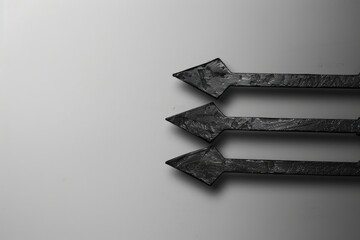 Aufkleber - Three metal arrows point in different directions, ready to be used as a symbol of direction, guidance or competition