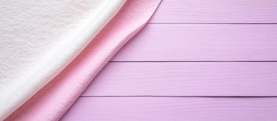 Aufkleber - Pink and white felt sheets on a lilac wooden surface with copyspace for text Felt backdrop