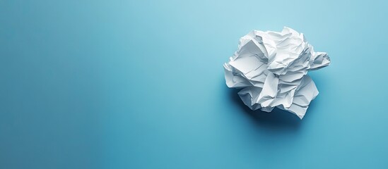 Aufkleber - A crumpled white paper on a blue background Concept of a creativity crisis. with copy space image. Place for adding text or design
