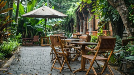Poster - A patio with a wooden table and chairs, and an umbrella