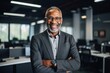 © NikoG - Portrait of a senior African American businessman in office