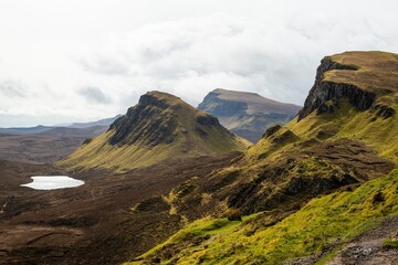 Wall Mural - View of the Quiraing landslip on the Isle of Skye, Scotland with rugged hills