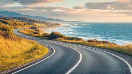 Picturesque coastal road with ocean views and rolling waves, capturing the essence of a scenic drive