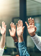 © JordaanExams/peopleimages.com - Audience, crowd and ask question with staff at workshop for training, feedback or answer orientation query. Group, hands raised and business people vote in office for volunteer, agreement or support.