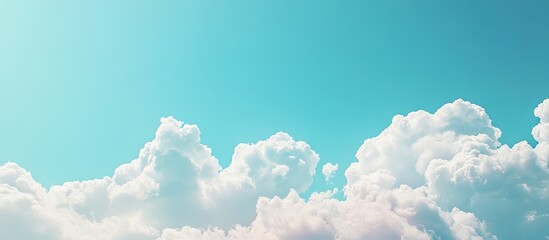 Sticker - Pale blue sky with vibrant color White clouds dispersed throughout. with copy space image. Place for adding text or design