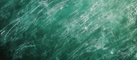 Poster - The surface of a green school chalkboard marked with chalk Education in schools. with copy space image. Place for adding text or design