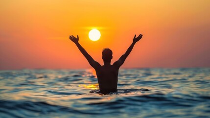 A man raised his hands high in a gesture of freedom and happiness. Silhouettes against the bright sky Capture moments of calm and reflection.