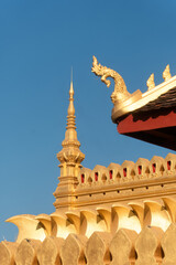 Wall Mural - details of The stupa of Pha That Luang a large, gold-covered Buddhist stupa and a national symbol in the center of the city of Vientiane, capital of Laos.