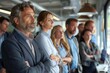 © Yuliia - Beautiful group of businesspeople observing as a handsome businessman blames his colleague during a tense meeting in the office.