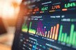 © Sunday Cat Studio - Vibrant data visualization on a screen shows financial trends and statistics with colorful graphs and charts.