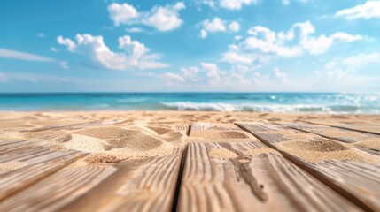 Wooden boardwalk on sandy beach. View of sea and sky.