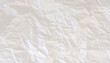 © Noor - White paper sheet texture background with crumpled wrinkled and rough pattern