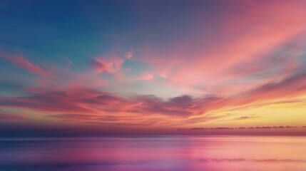 Pink Clouds Over Calm Water at Sunrise