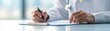 © BoOm - A doctor prepares notes while writing on a clipboard in a modern medical office, symbolizing healthcare and professionalism.