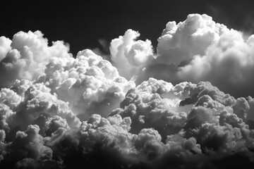 Poster - A black and white photo of clouds in the sky, suitable for use as a background or atmospheric element