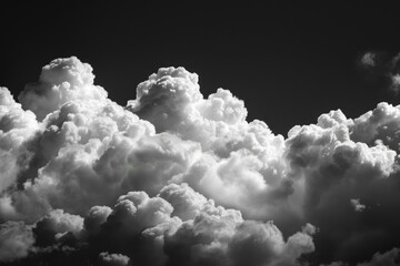 Poster - A black and white photo of clouds drifting lazily across the sky