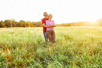 Wall Mural - woman man outdoor senior couple happy lifestyle retirement together smiling love old nature mature e