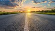 © florynstudio3 - A long, straight road stretching towards the horizon, illuminated by the golden glow of a setting sun. The sky is filled with wispy clouds, casting long shadows across the asphalt.