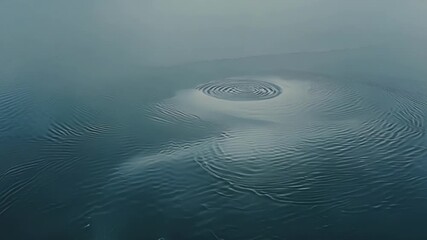 Poster - Through the lens we see the winds powerful influence on the water as it carves out intricate designs and shapes on the surface.