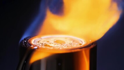 Aufkleber - In extreme closeup the radiant heat of the lighters flame can be seen distorting the air around it.