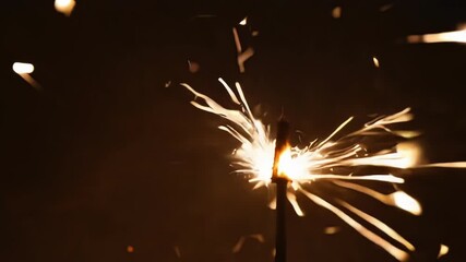 Aufkleber - Slow motion closeup of a sparkler spark with each tiny flame appearing to have a life of its own.
