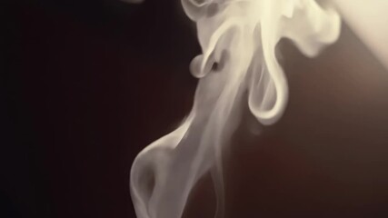 Aufkleber - Macro shot of an incense stick burning with thin tendrils of smoke rising up to the ceiling in a fragrant cloud.
