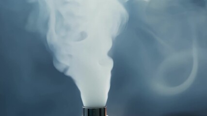 Aufkleber - A handheld vape emitting thick milky smoke rings that steadily rise and disappear into the air.