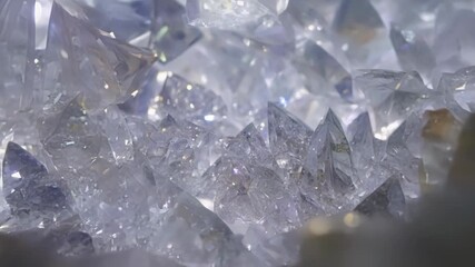 Aufkleber - A closeup of a small crevice in a rocky surface revealing a hidden world of intricate crystal formations nestled within.