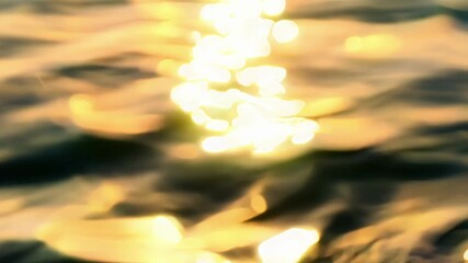 Aufkleber - Brilliant sunlight dances on the rippling water painting glimmering patterns on its everchanging surface.