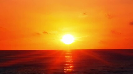 Poster - A zoomedin view of the suns final moments casting a warm glow over the ocean and creating a breathtaking sight.