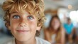 © LifeMedia - This close-up image focuses on a young boy with curly hair and striking blue eyes, capturing his innocent expressions and highlighting the beauty of childhood moments.