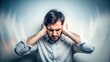 © Collection - Blurry image of a person holding their ears in pain as a loud noise fades away slowly , sound, noise, fade, fading, loud, ear