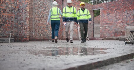 Poster - Legs, team and walking in construction site as engineer, project manager or supervisor for collaboration. Group of people, property and development for apartment building or real estate for remodel