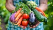 © Turzo Khan - hand holding a bunch of many types of mixing vegetables