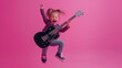 © _veiksme_ - Excited Little Girl Jumping While Playing a Black Electric Guitar