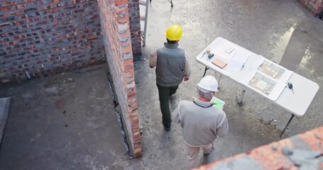 Aufkleber - Top view, architects and tablet for floor plan in house, design and walking on construction site. People, contractor and together for inspection of infrastructure, renovation and teamwork for build