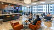 © Swaroop - A relaxed office break room with employees enjoying coffee and snacks, comfortable seating, and natural light creating a welcoming atmosphere.