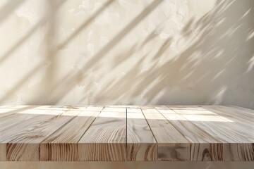 Wall Mural - Close-up of a table with soft shadow on beige background for product display or presentation mockup