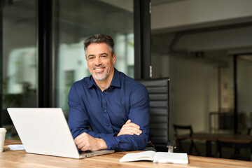 portrait of happy mature professional business owner man manager, smiling senior male ceo executive,