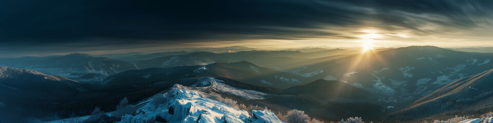 Wall Mural - a mountain range with a bright sun shining on it
