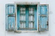 © Digital ArT - A blue window in the center and a white wall. Traditional greek architecture