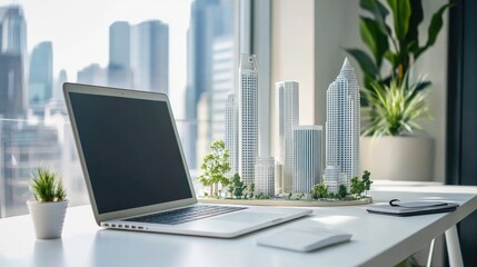 Poster - Clean workspace with an open laptop and a futuristic city model
