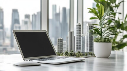 Poster - Clean workspace with an open laptop and a futuristic city model