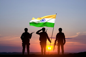 Canvas Print - Silhouettes of a soldiers with India flag against the sunset. Independence Day, Republic Day concept