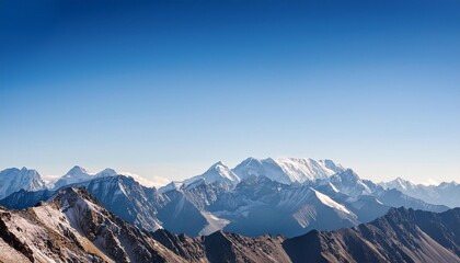 Wall Mural - serene mountain range under clear blue sky