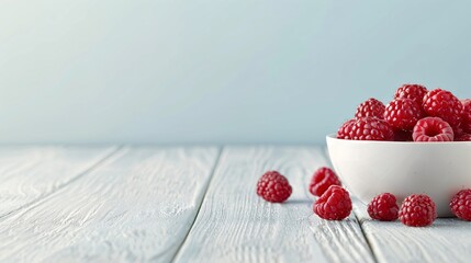 Fresh Raspberries in a White Bowl