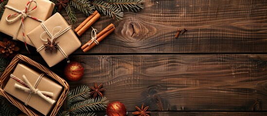 Aufkleber - Festive Christmas gifts displayed on a wooden background including boxes a star anise a basket cinnamon and a snowflake with copy space for customization