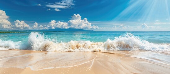 Poster - Scenic tropical beach with waves crashing on sandy shore and clear blue skies perfect for a copy space image