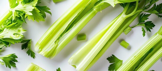 Poster - Close up of celery with a white background provides ample copy space image